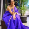 Lady in a handwoven bamboo silk saree in blue colour