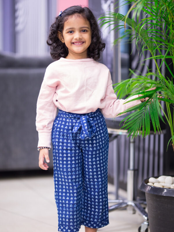 Girl wearing handblock printed capris