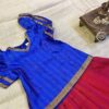 Traditional Attire and timeless charm in this blue and red pavadai sattai for girls